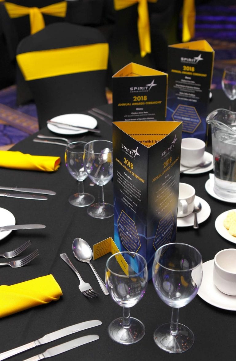 Corporate event themed table place setting design