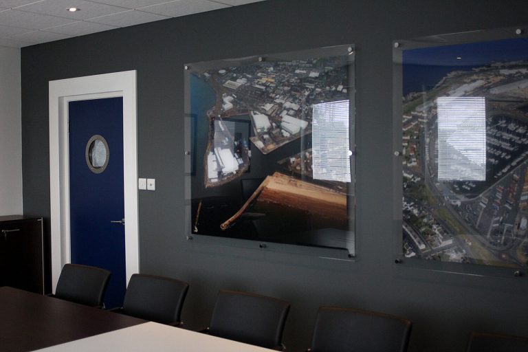 Feature wall design with full colour aerial photographs of Ayr and Troon ports.